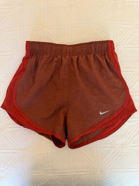 Orange Nike shorts